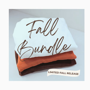 Stacked folded hoodies in white, orange, and dark brown. Overlay text reads “Fall Bundle” in script, with a “Limited Fall Release” label in the corner.