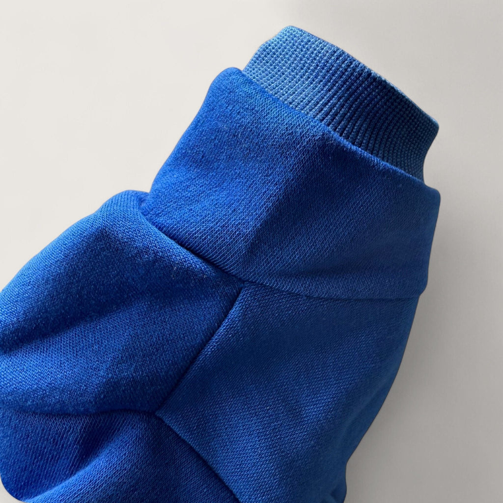 Polyester Dog Hoodie - Blue, up close of stitching quality – blank dog apparel for makers and small brands | Fetch Blanks