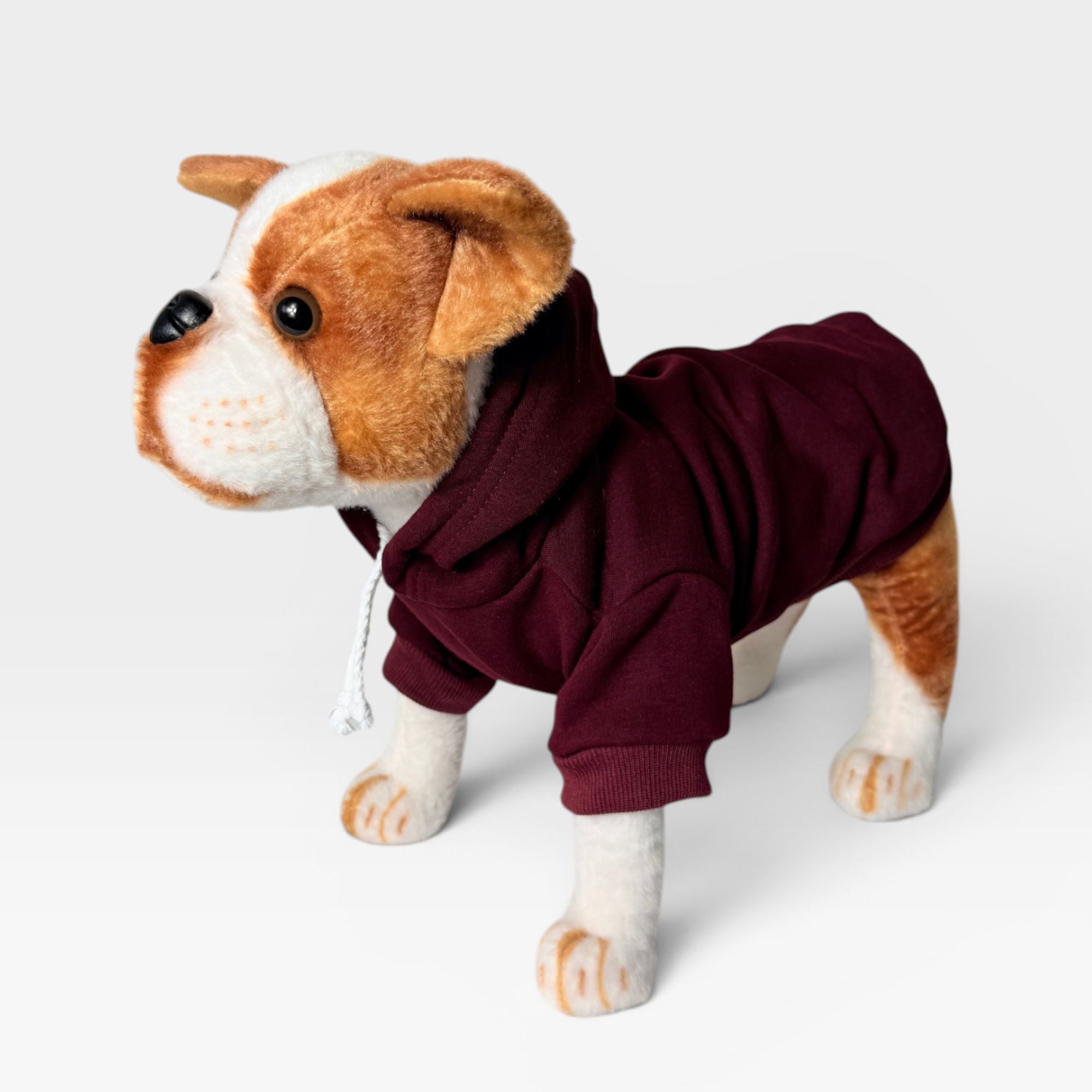 Maroon blank dog hoodie shown at an angle with hood and sleeve details