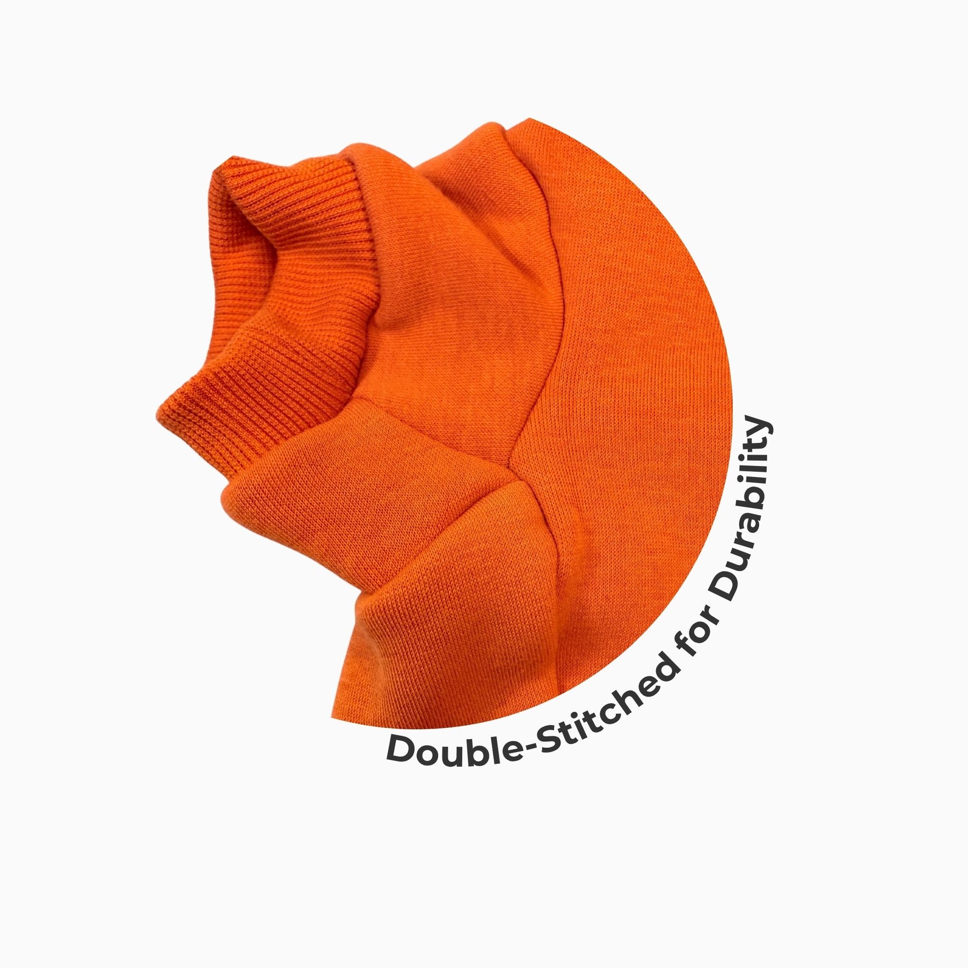 Detail shot of orange blank dog hoodie cuff with reinforced double stitching - durable pet apparel for everyday use.