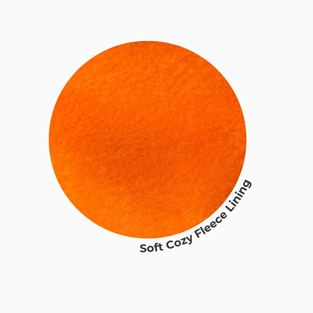 Close-up of soft orange fleece lining used in blank dog hoodies – plush fabric ideal for cozy, customizable pet apparel.