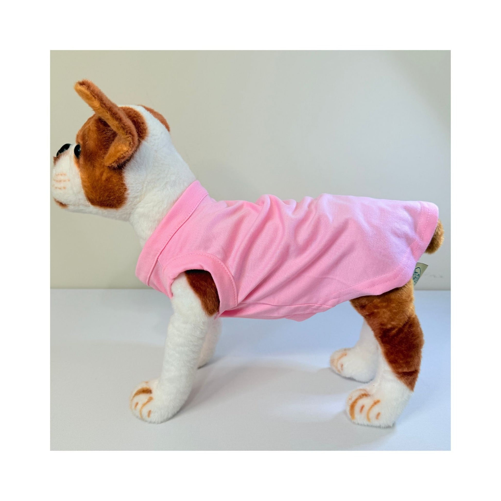 Full side profile of stuffed dog model wearing pink blank t-shirt - lightweight pet apparel for small dogs, personalization, and spring drops