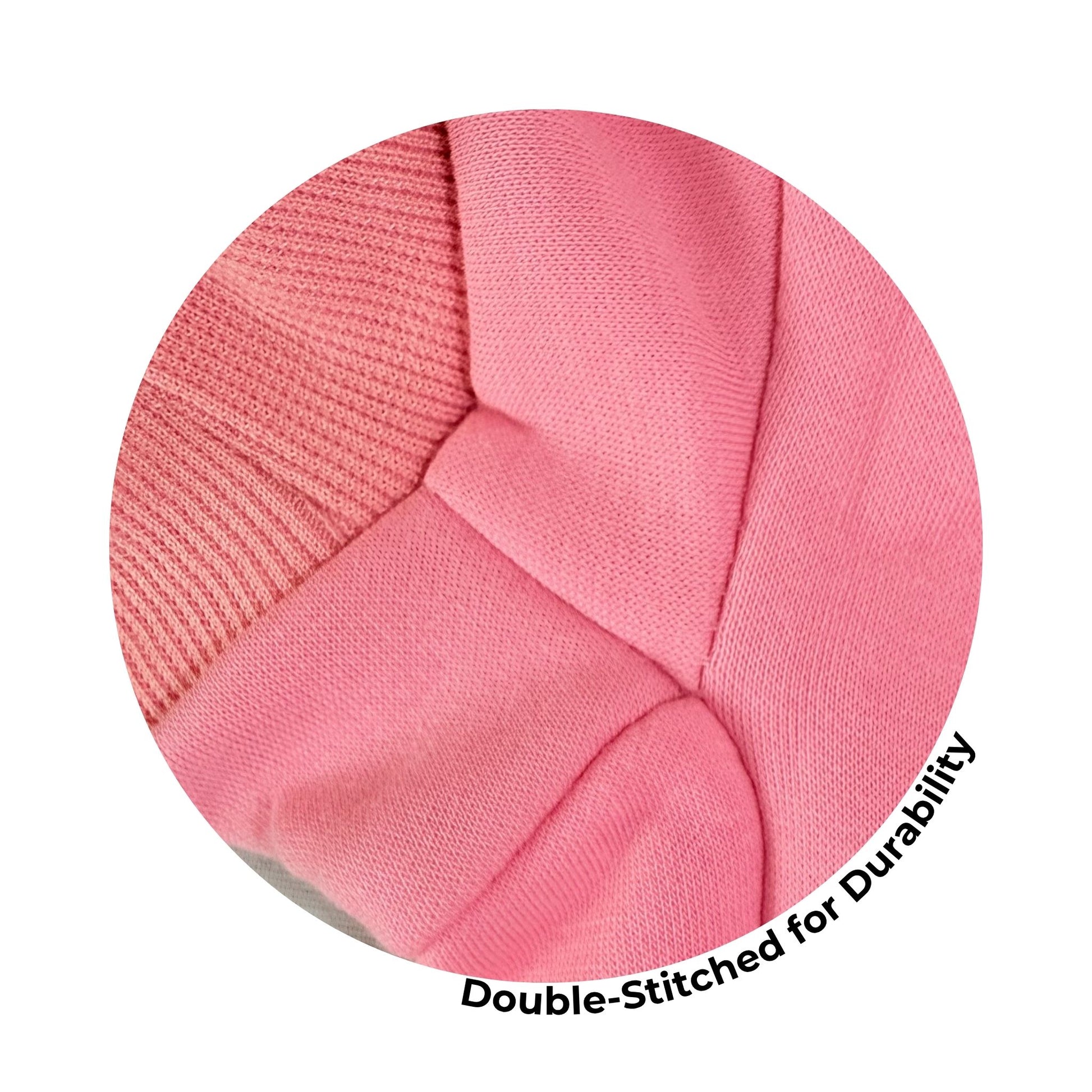 Close-up of pink pet hoodie seam highlighting double-stitched construction for extra durability